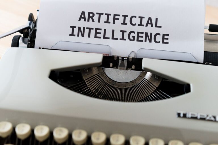 Crafting Captivating Headlines: Your awesome post title goes here A close-up of a typewriter showcasing 'ARTIFICIAL INTELLIGENCE' on paper.